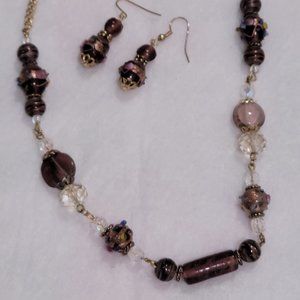 gold tone chain necklace and earrings with hand blown glass beads